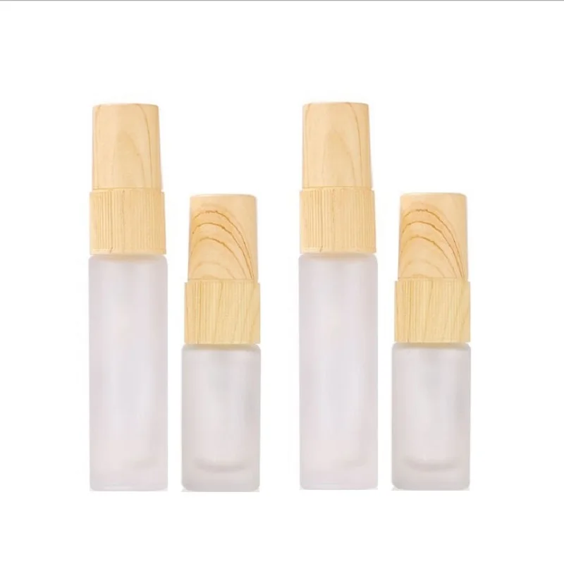 

5ml 10ml Empty White Frost Glass Spray Bottle False Wood Plastic Lid Portable Cosmetic Packaging Perfume Refillable Vials 50pcs