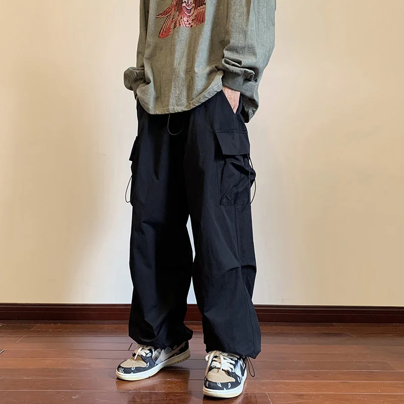 

2023 New Spring Casual Pants Men Elastic Waist Solid Color Cargo Joggers Pants Multi Pocket Loose Harajuku Baggy Pants For Women