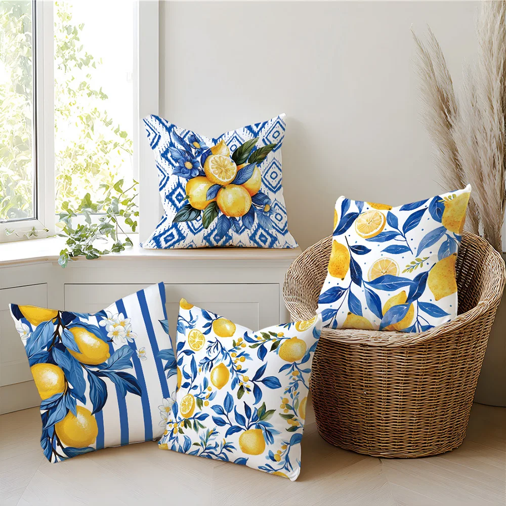 Coordinating citrus print cushions in a living room setting