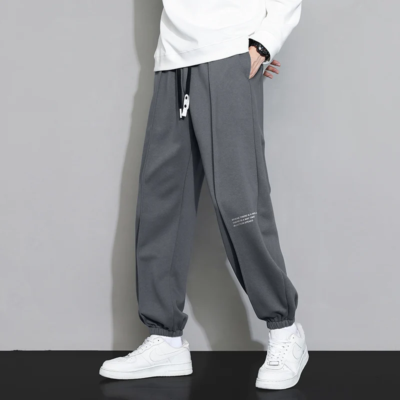 Autumn and Winter Men's Elastic Waist Panel Pocket Letter Fashion Solid Color Tie Feet Loose Sports Versatile Casual Pants men jogger pants men jogger sweatpants