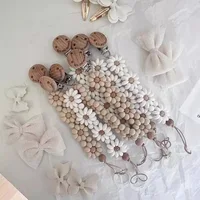 Attache-sucette en Silicone pour bébé, Clip de sucette en forme de fleur, fait à la main, porte-mamelon factice, jouets de dentition essentiels pour nouveau-né 1