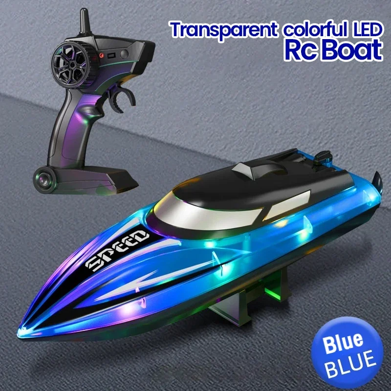 Détail des lumières LED multicolores sur le bateau RC télécommandé, éclairant la nuit.