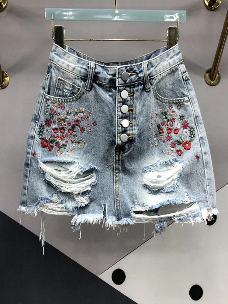 

Women's Summer Perforated Embroidered Denim Skirt New Single Breasted High Waist Wrapped Hip Anti Stray Light A Line Short Skirt