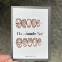 10pcs Glossy Cat Eye Press on Nails Nude Pink False Nails Hand Drawn Flower Pearl Nail Full Cover Chrome Powder Fake Nail Almond