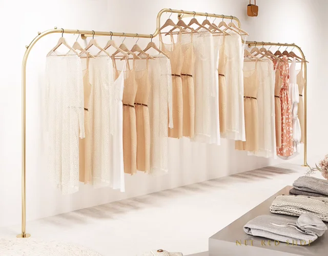 Wall mounted hanging clothes pole on the display rack Wall mounted hanging clothes pole on the display rack