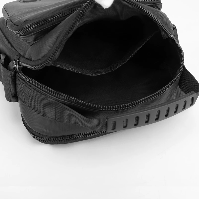 Durable crossbody bag, adjustable shoulder strap, multi-layer design, secure zipper - multifunctional storage bag