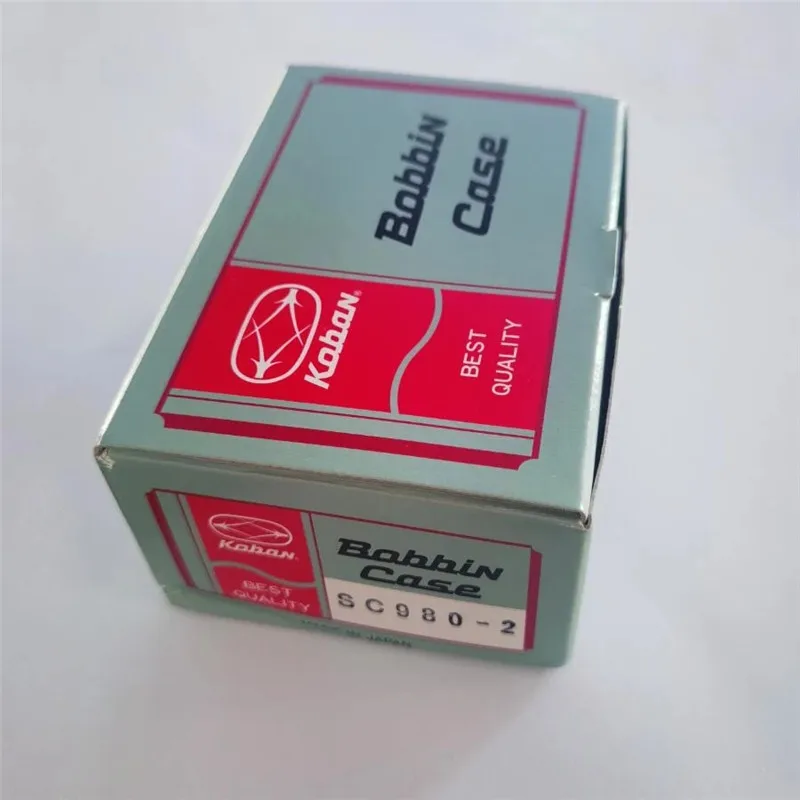 50PCS Original Koban SC980-2 BOBBIN CASE FOR JUKl 1850 / 1900 / 1900A Brother 430 430D
