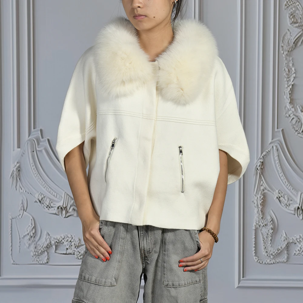 Women modeling casual knit sweater with pockets