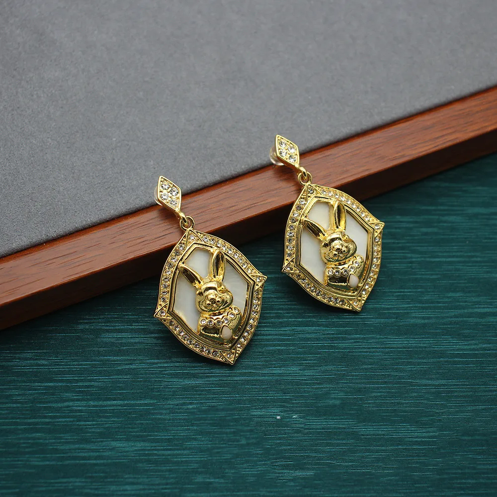 

Europe and America Butterfly Shell Rabbit Pendant Earrings