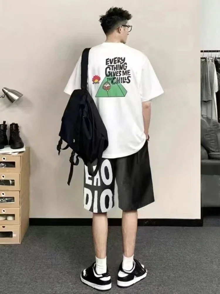 thumbnail image 1 of Conjunto de camiseta y pantalones cortos para hombre, estampado gráfico blanco de algodón, nuevo conjunto de pantalones cortos a juego para hombre, ropa de verano de dos piezas estilo coreano 2024, 1 of 5