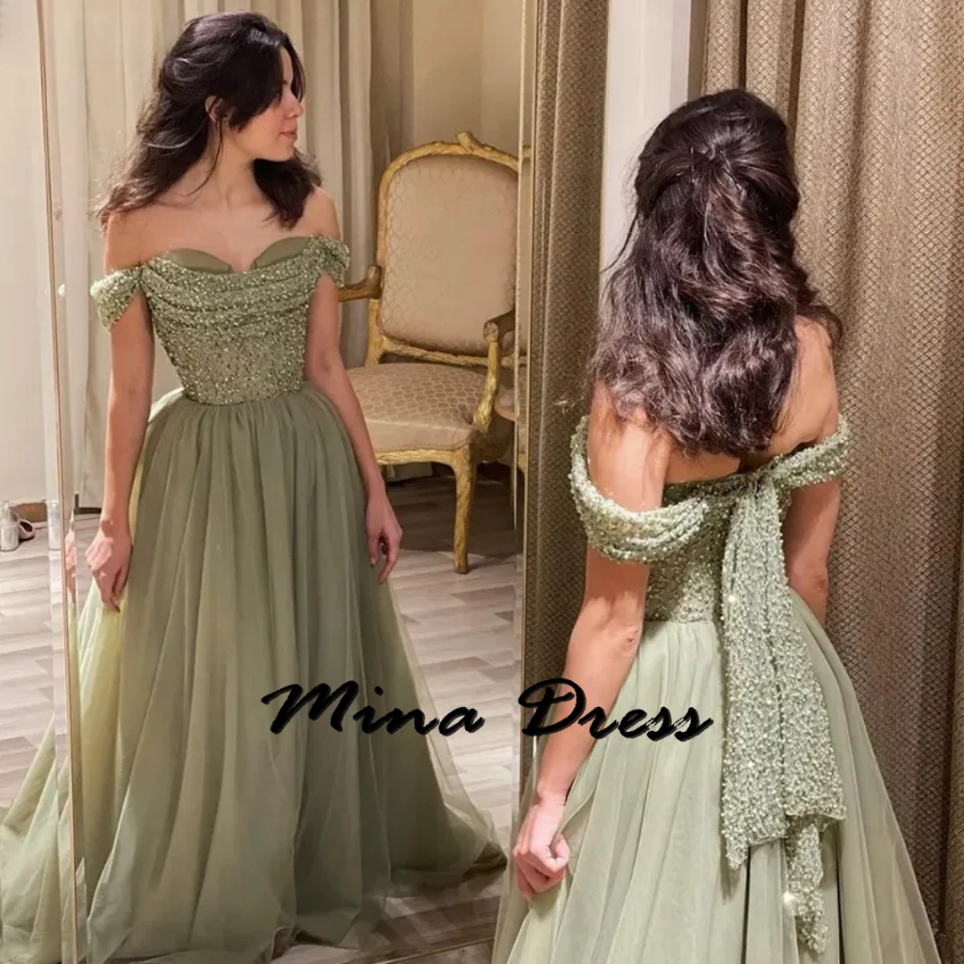 

Mina-Elegant square skirt with closed shoulders, sheer, sequins, sparkling green evening dress subtle