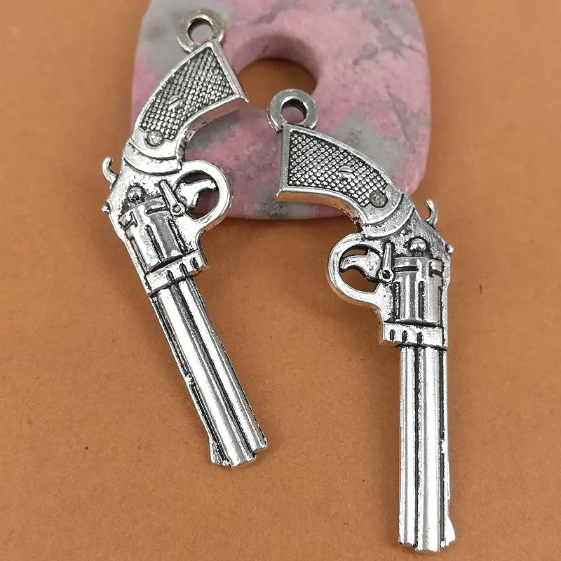 

4PCS 52x16MM tibetan silver color crafted 2sided gun design charms H0401