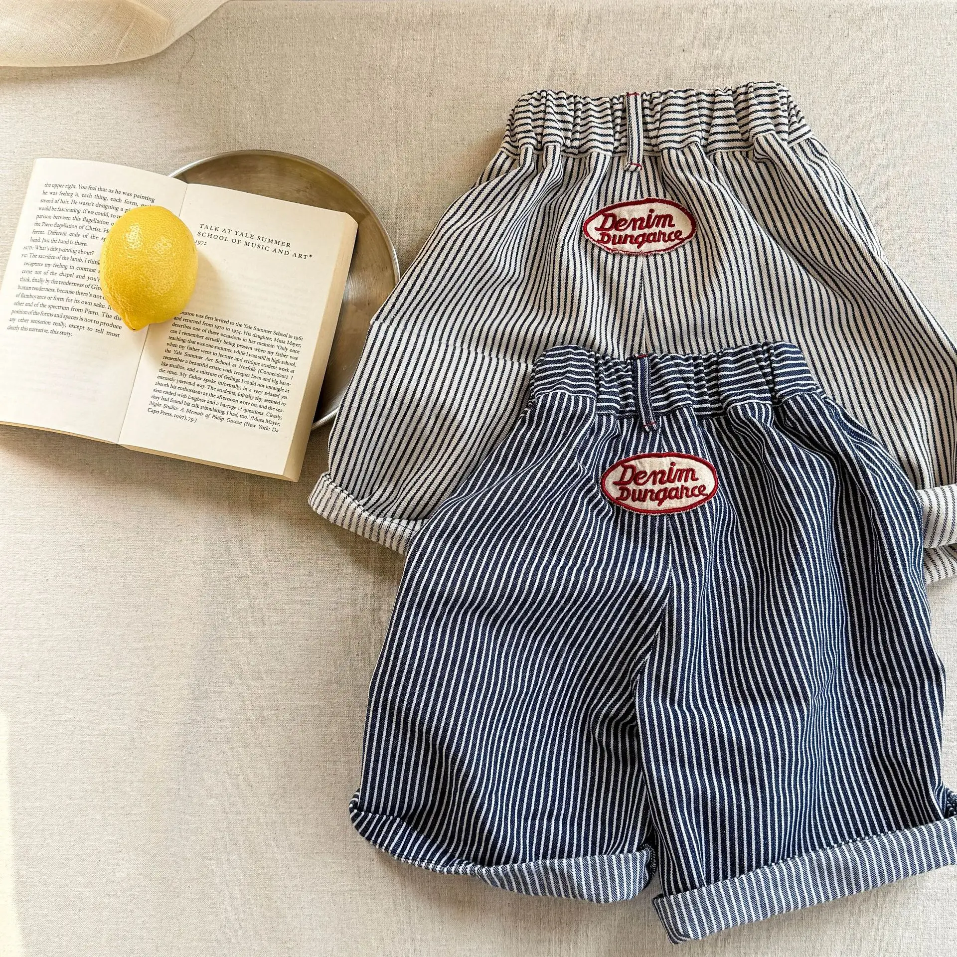 2025 صيف جديد الأطفال مخطط السراويل للبنين بنات فض...