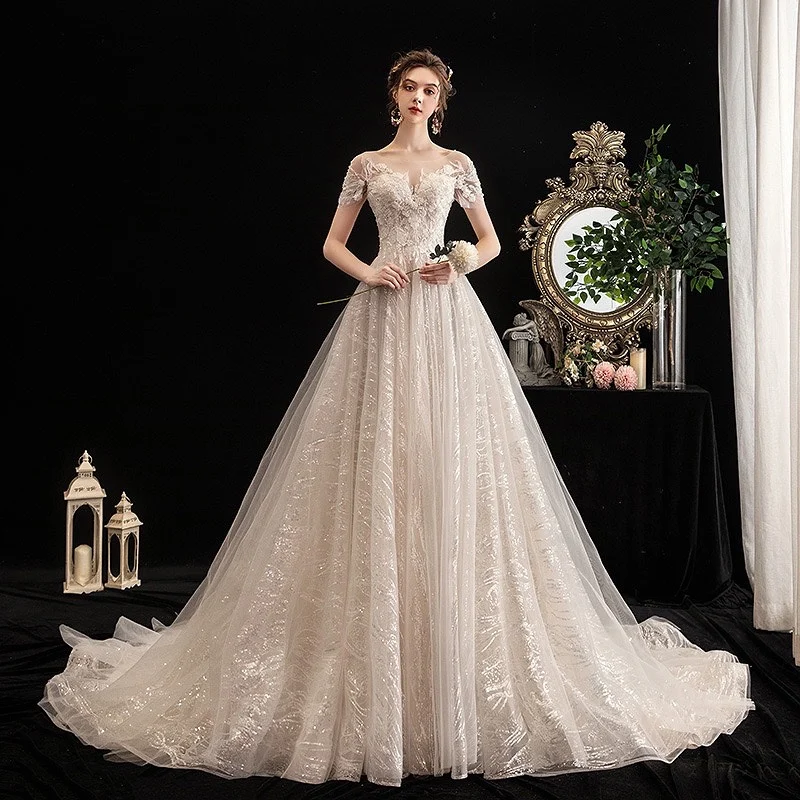 

Luxury Wedding Dresses A Line Princess Applique Lace Illusion O Neck Shiny Sequined Bead Off Shoulder Beach Party Bridal Gown