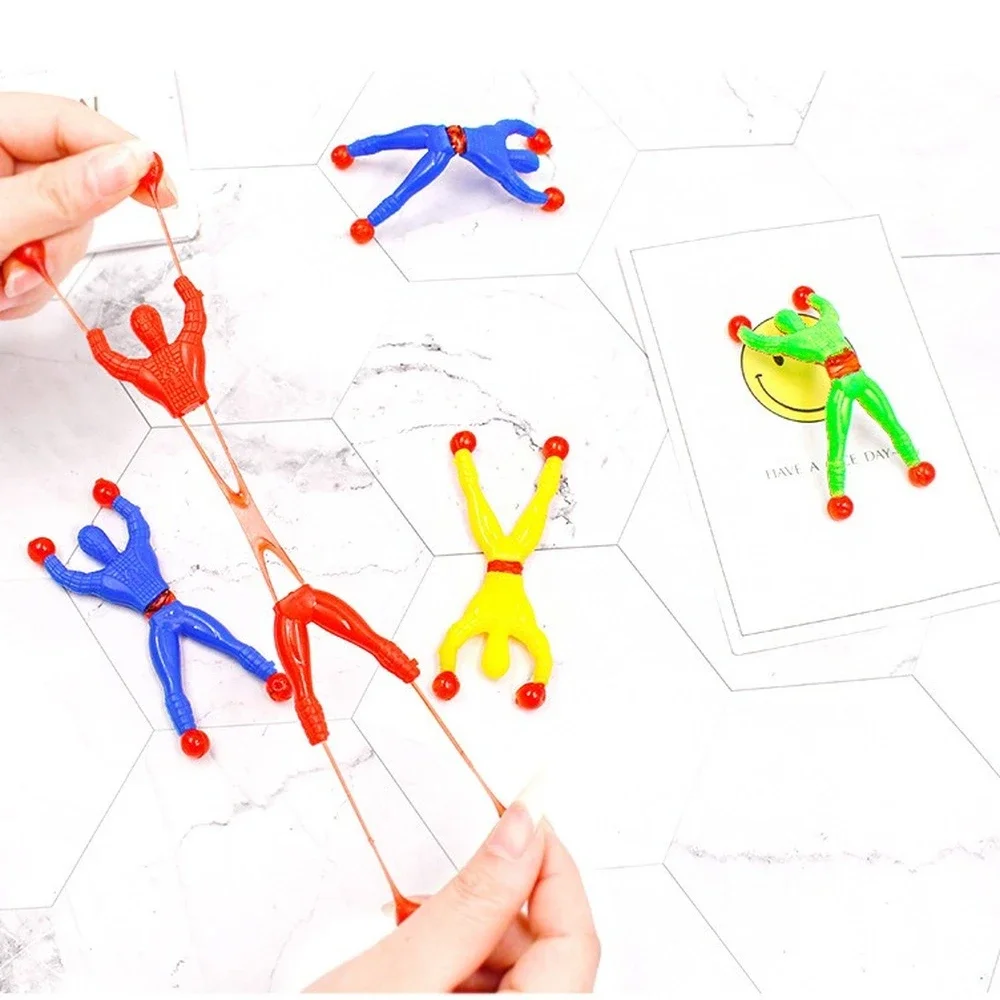 5 Pcs 9cm Prank Joke Toy Colourful Funny Viscosity Personage Halloween Kids Children Gags & Practical Jokes Wall Climbing Man prank toys