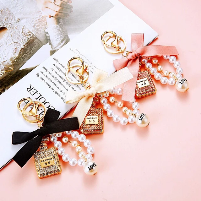 Temu Cute Perfume Bottle Keychain Golden Alloy Key Chain Ring Purse Bag Backpack Charm Earbud Case Cover Accessories Women, Christmas Styling & Gift