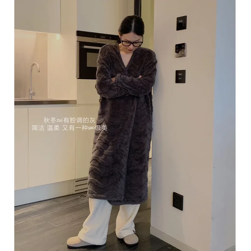 

Very lazy, just wear a thick insulated long sleeved jacket and a long bathrobe outside