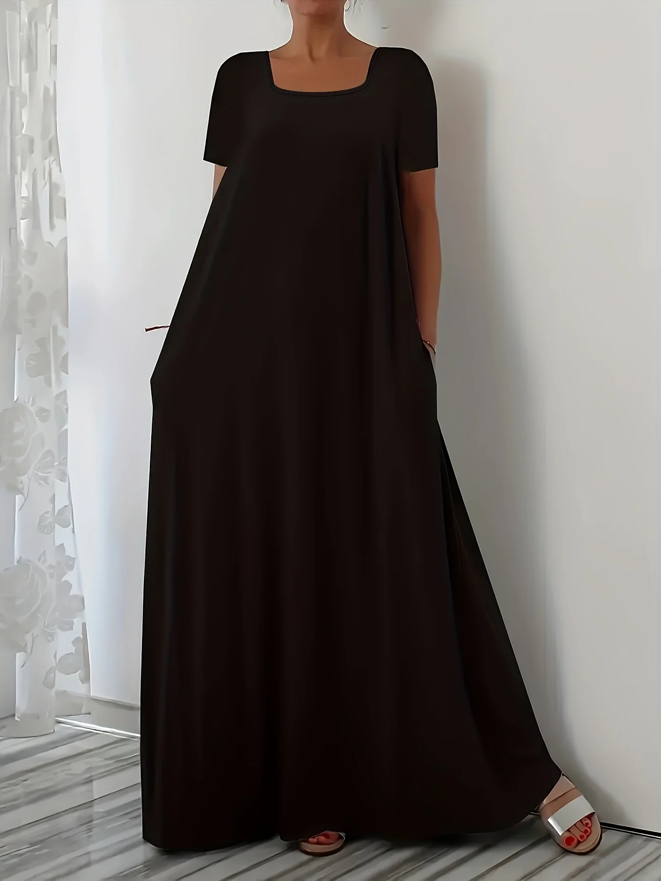 Großes Sommerkleid mit eckigem Ausschnitt, locker geschnitten, lässig, lang, schwarz, Kurzarm mit Tasche, im Lazy-Style, Übergröße
