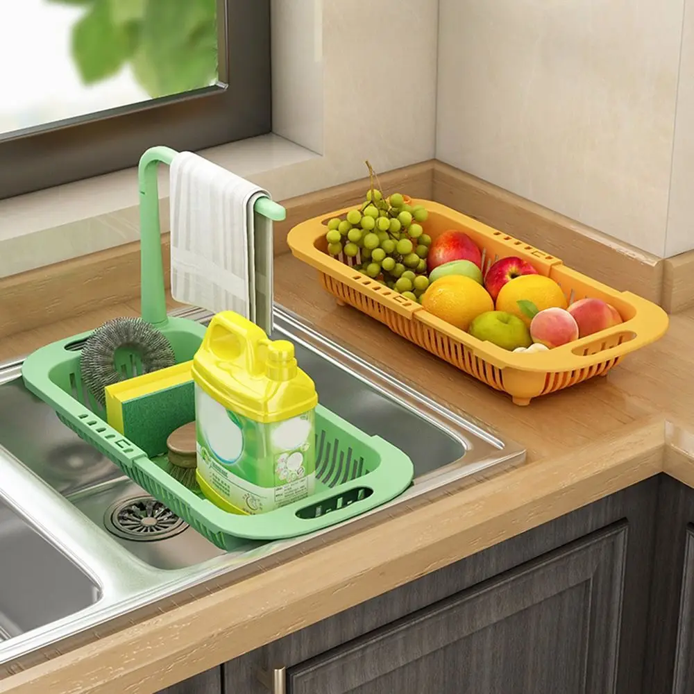 https://ae01.alicdn.com/kf/Sd5e5fcef16a1408ab2ea3c8521009e330/Adjustable-Length-Kitchen-Sink-Drain-Basket-Dish-Drainer-Telescopic-Sink-Rack-Kitchen-Accessories-Rag-Soap-Storage.jpg