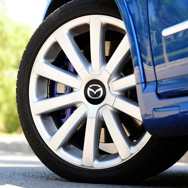 4pcs 60mm Car Wheel Center Cover Hub Cap Auto Decoration Accessories For Mazda 2 3 5 6 323 626 CX3 CX5 CX7 MX5 RX8 Atenza Axela wheel hub covers wheel hub caps