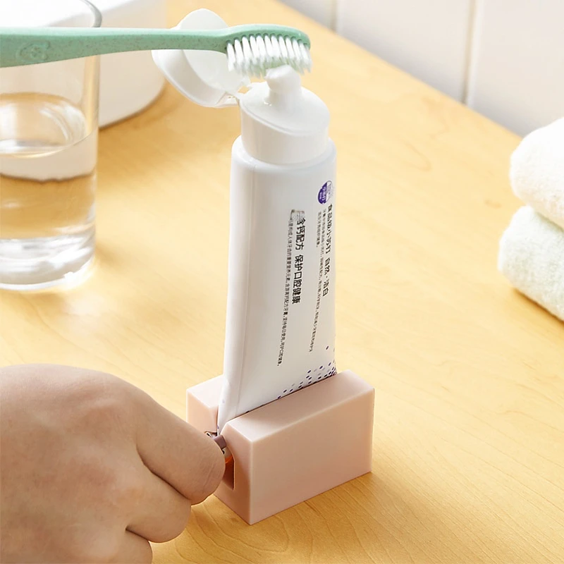 

Multi-Function Creative Rolling Toothpaste Squeezer Holder Cleanser Dispenser Cosmetic Organizer No Waste Bathroom Accessories