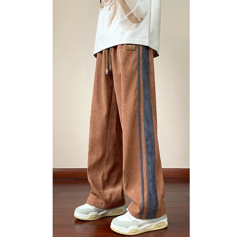 

Fashion Elastic Spliced Striped Corduroy Casual Pants Men's Clothing 2024 Spring Autumn New Loose All-match Straight Trousers