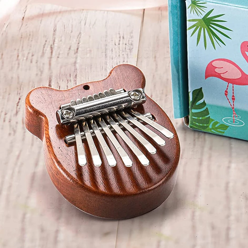 Piano à pouce Kalimba, Mini Kalimba aux tons clairs et brillants,  conception de trous de suspension à 8 touches pour les - Cdiscount  Electroménager