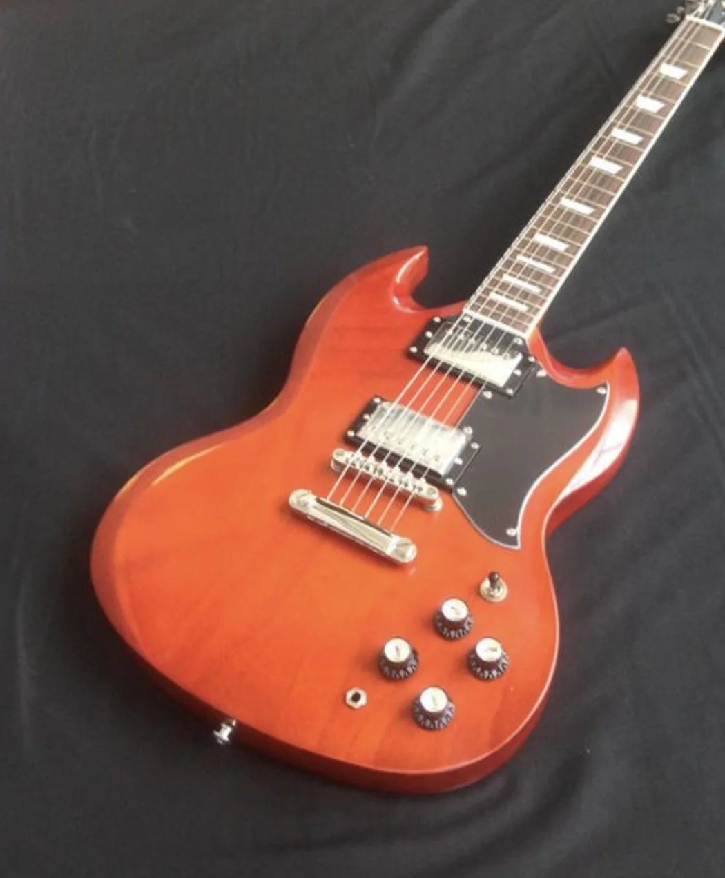 black S.G electric guitar with silvery accessories with hardcase