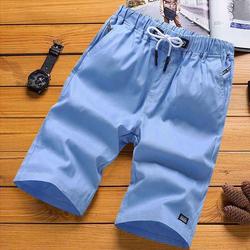 2023 new summer men's shorts casual white simple and relaxed tide brand five-point sports beach pants pants