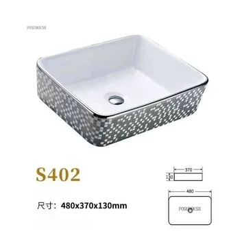 อ่างล้างหน้าสไตล์เรโทรสีทอง อ่างล้างหน้าแบบตั้งบนเคาน์เตอร์สีเงิน อ่างล้างหน้าเซรามิกหรูหรา อ่างล้างหน้าแบบติดตั้งในตัวสำหรับโรงแรม อ่างล้างหน้าสำหรับระเบียง 1