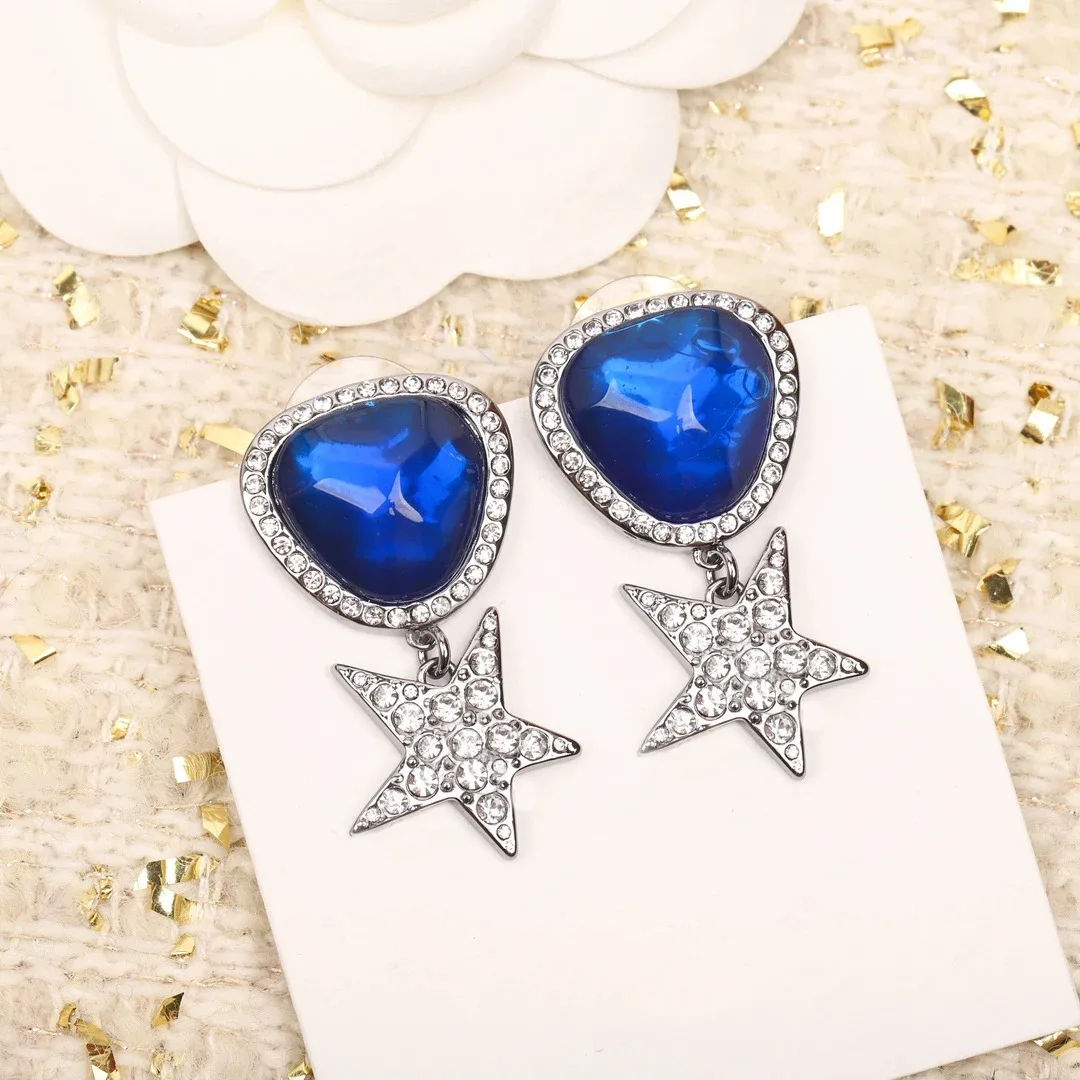 

Ожерелье женское с голубыми кристаллами и звездой