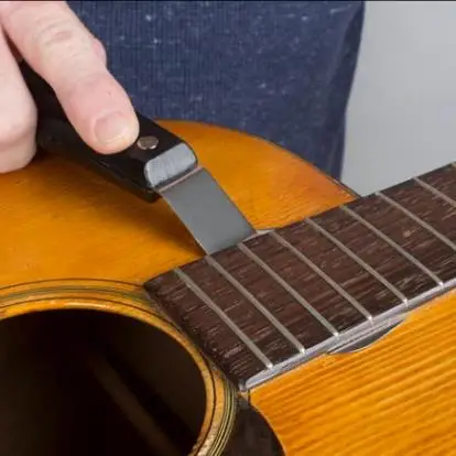 Acoustic guitar repair Professional instrument repair disassemble flat
