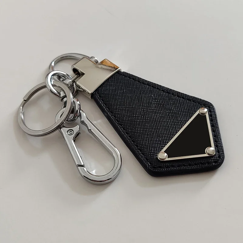 

1pcs Inverted Triangle Brand Logo Metal Letter Car Keychain Leather Unisex Personalized Pendant Pendant Decoration