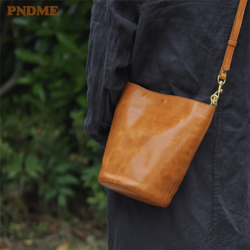 

PNDME simple high quality genuine leather women's bucket bag weekend outdoor casual luxury real cowhide female shoulder bag