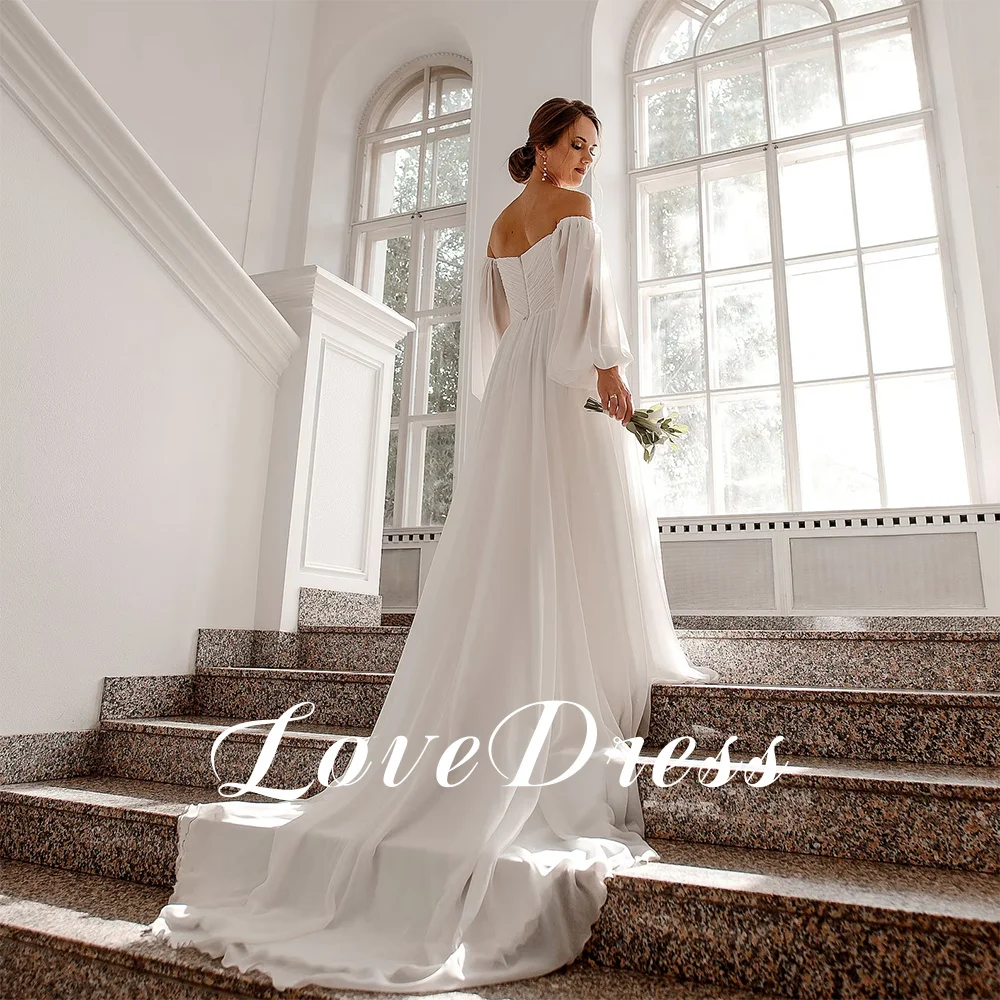sachin and babi light blue dress A romantic A-line silhouette with delicate detail and modern femininity.  Crafted from mesh, Chantilly lace, chiffon, and eurotaffeta in a soft ivory  tone, this gown features a sheer illusion bodice richly embroidered main image 1