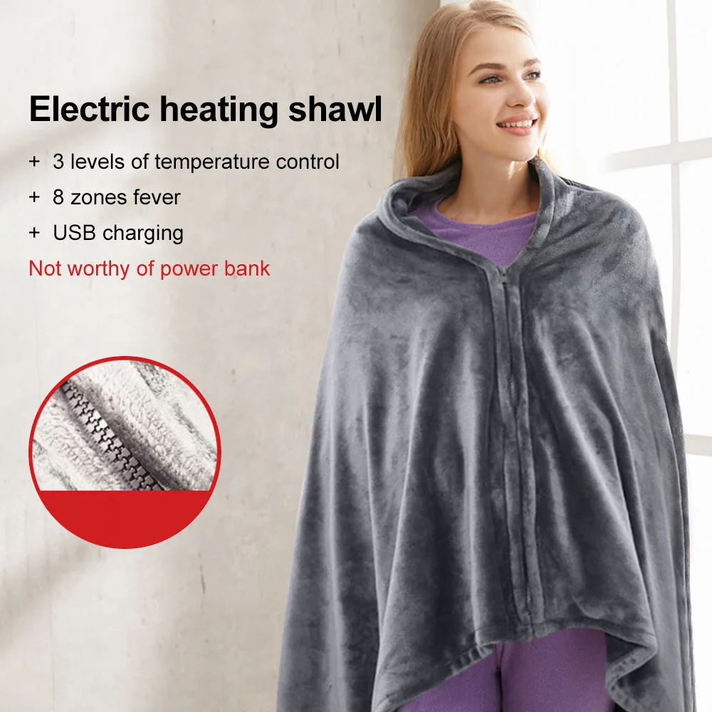 A stylish woman staying warm with a USB Heated Shawl.