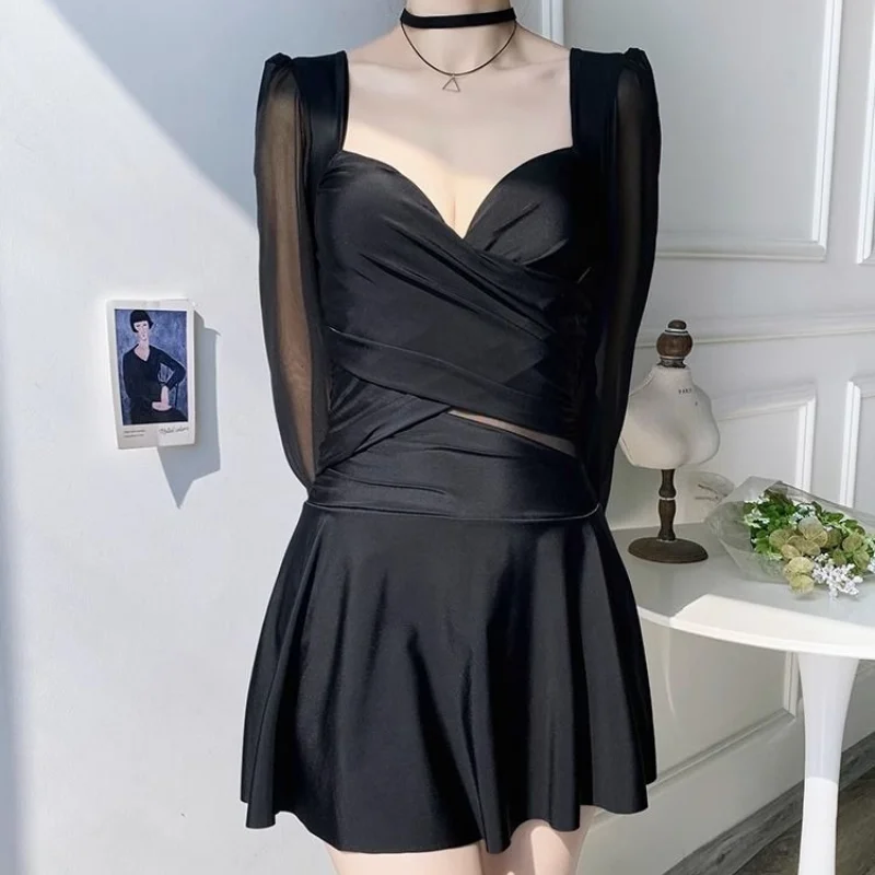 2023 New Summer Women's Conjoined Body Conservative Long Sleeve Steel Bracket with Chest Pad Solid Color Casual Ruffles Swimwear