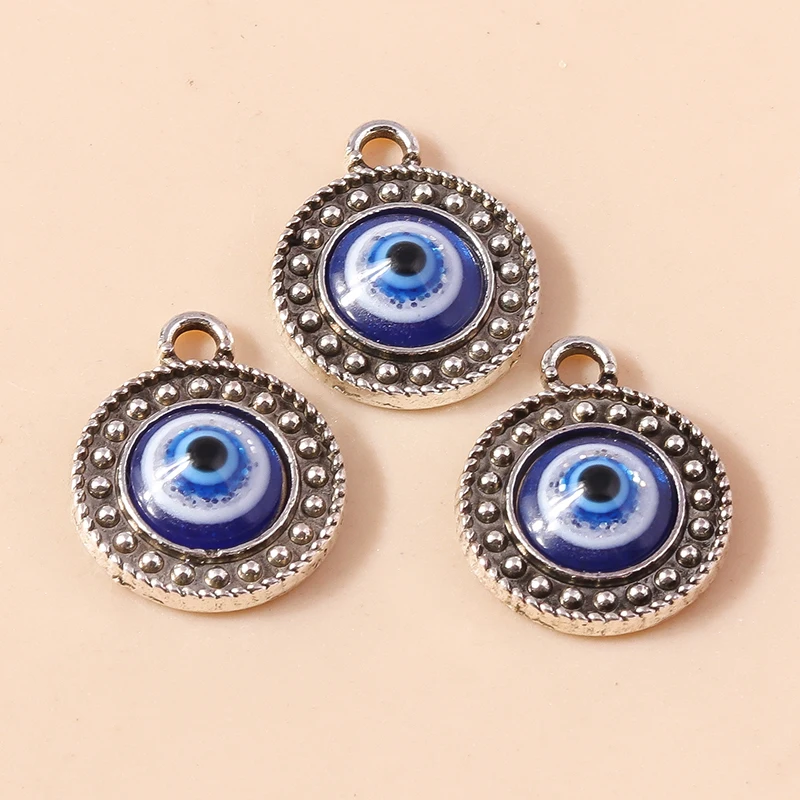 XHBTS Set di orecchini a cerchio con ciondolo a forma di malocchio e cristalli di zirconia cubica scintillanti e bracciale per donne e ragazze