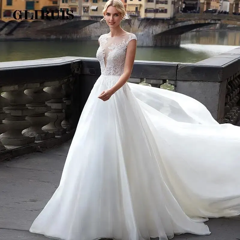 

Graceful Cap Sleeve Wedding Dresses Ball Gown White 2022 Robe De Mariée Appliques Tulle Bridal Gowns with Court Train