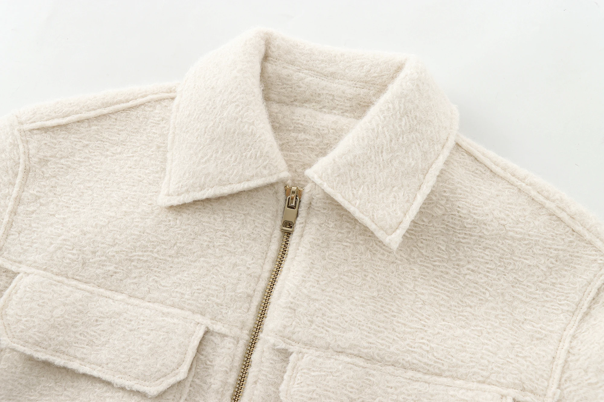 Women's winter crop jacket featuring a classic turn-down collar and solid color.