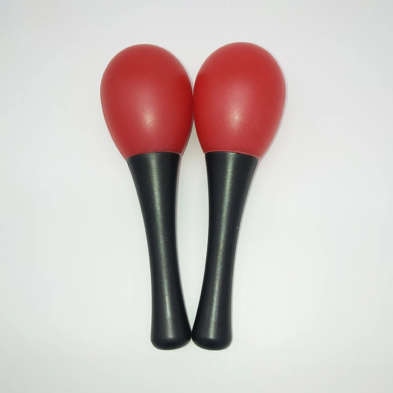Plastic maracas Orff instrument players hold plastic maracas Toddlers Early education Children grasp egg