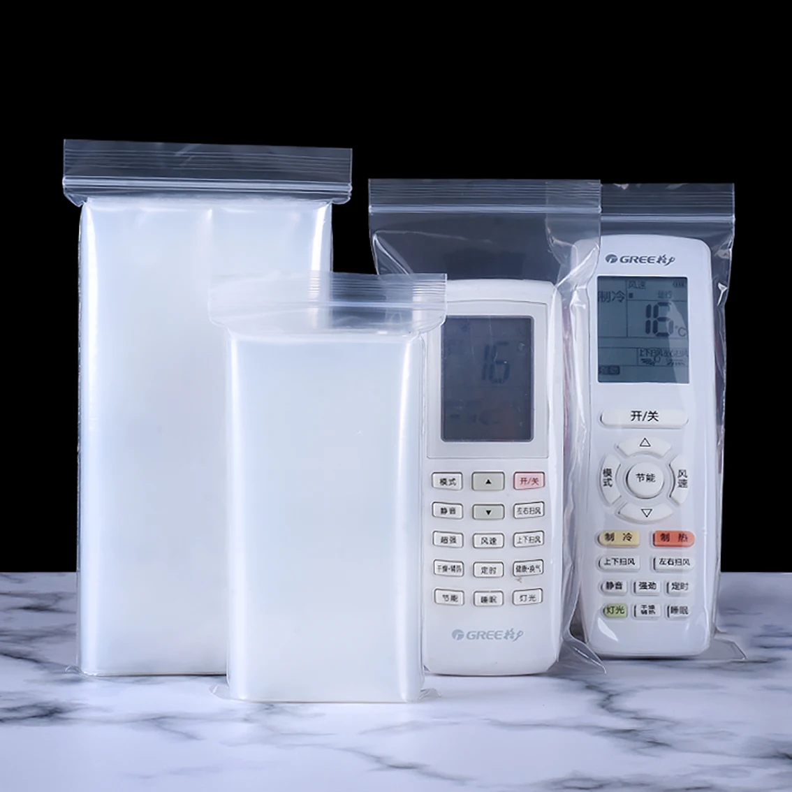 

100Pcs Reusable PE Transparent Ziplock Bag TV Remote Control Case Cover Air Condition Remote Control Protective Anti-dust Bag