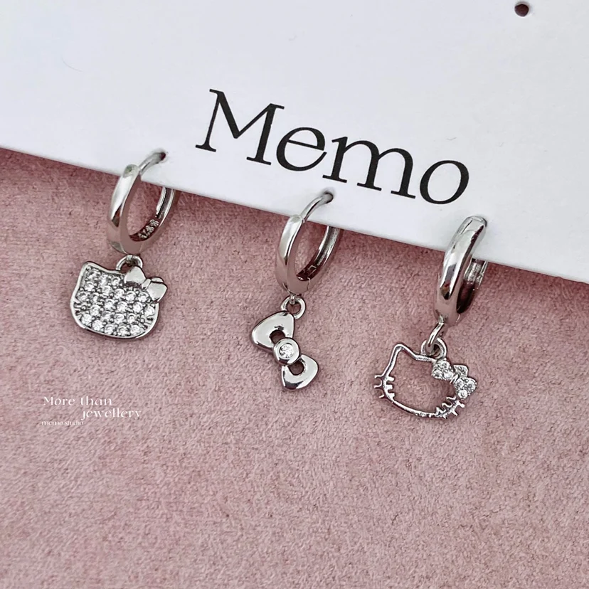 

Sanrio Hello Kitty Ear Studs Cute Y2k Sweet Cool Spice Girl Earring Kitty Full Drill Bow Cat Head Ear Hoop Earring Set