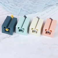 1Pc Bathroom Kitchen Squeeze Tube Squeezer Easy Plastic Press Toothpaste Dispenser 2