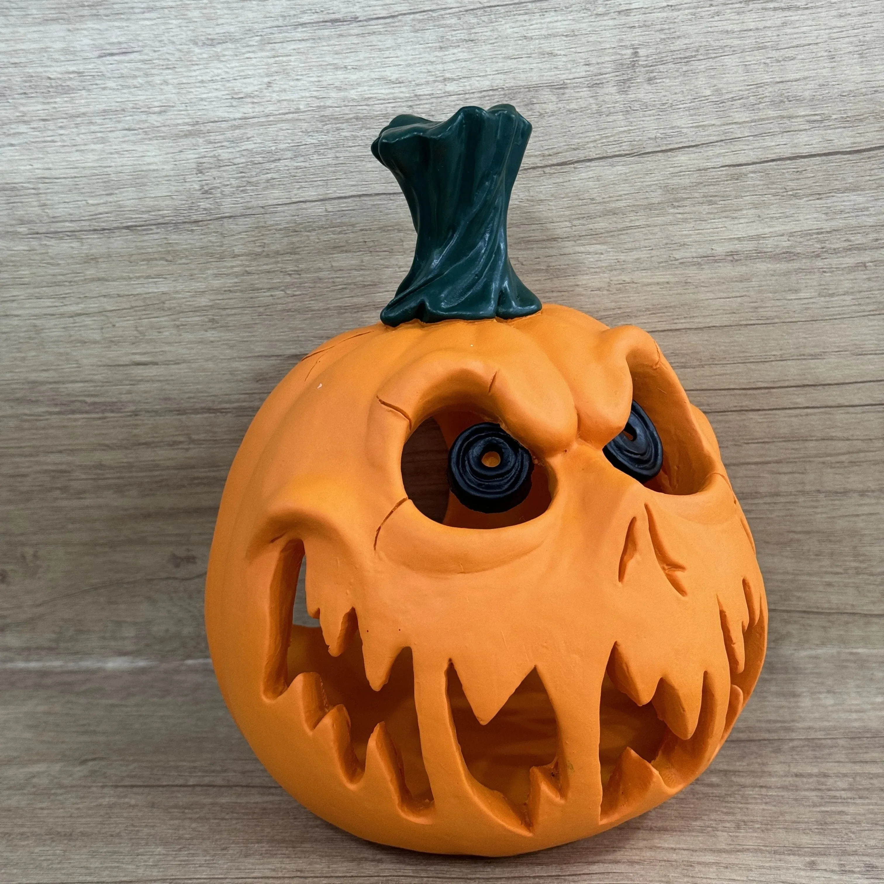 Pumpkin skull resin decor angled view