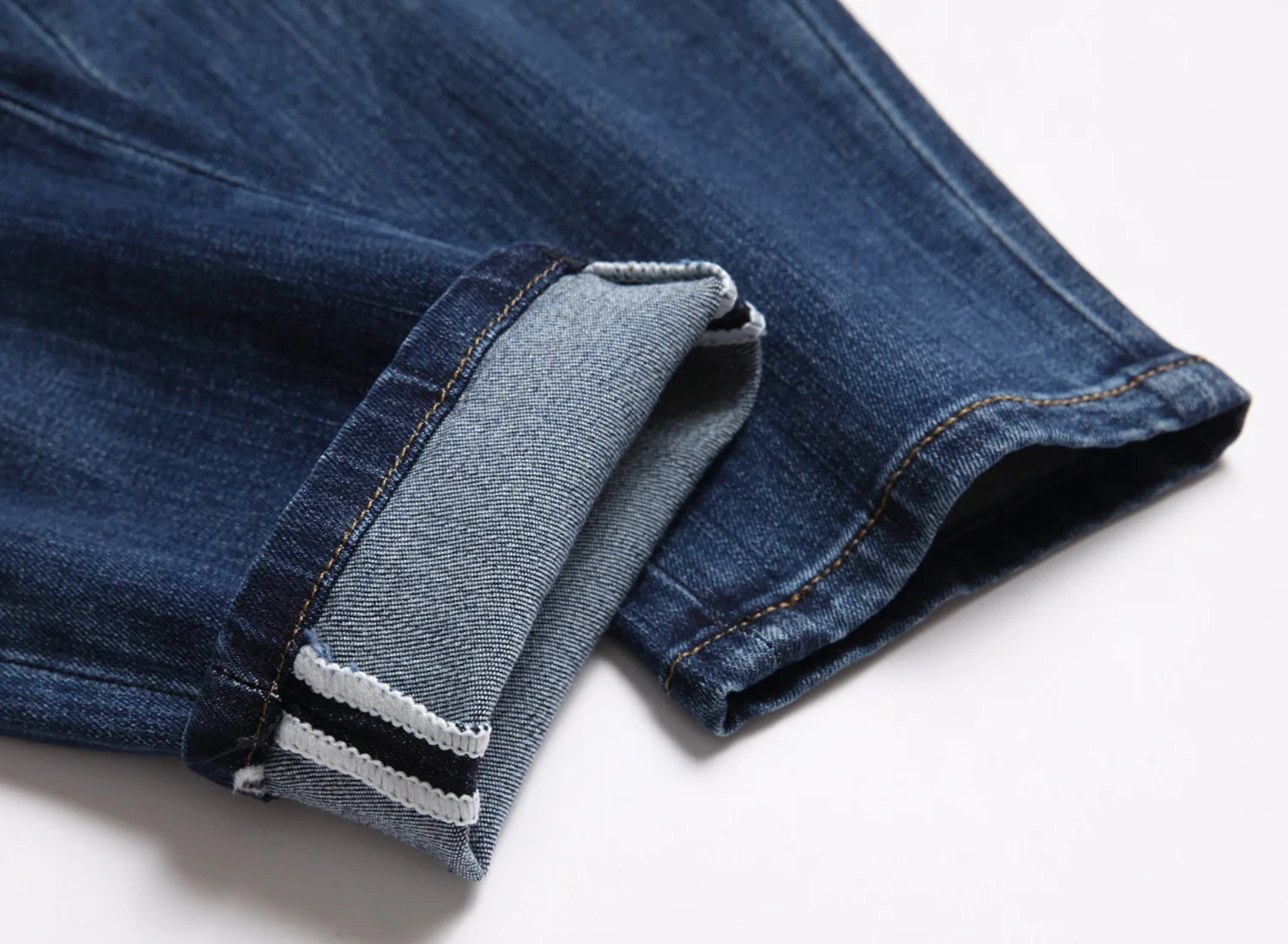 Manufacturers directly for men's European and American  jeans small foot hole pants wash elastic 