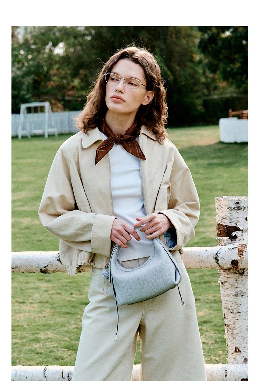 Half moon leather tote, handle design