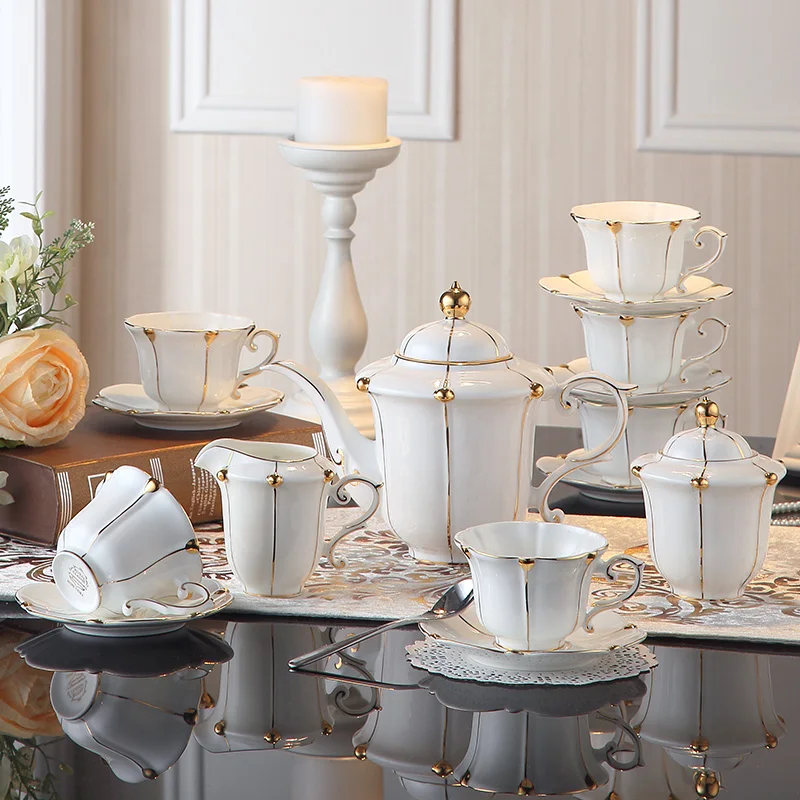 https://ae01.alicdn.com/kf/Sd737b199aa394c12b4f670b6ad5c88c09/Gold-Pearl-Bone-China-Coffee-Set-British-Porcelain-Tea-Set-Luxury-Ceramic-Pot-Creamer-Sugar-Bowl.jpg