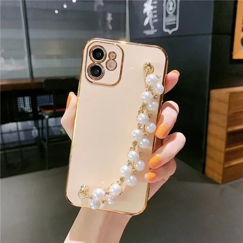 thumbnail image 1 of Funda blanda con cadena y pulsera de perlas chapadas de lujo para iPhone 15, 13, 14, 12 Pro Max, 11, XS, X, XR, 7, 8 Plus, mini SE, funda de silicona con purpurina, 1 of 5