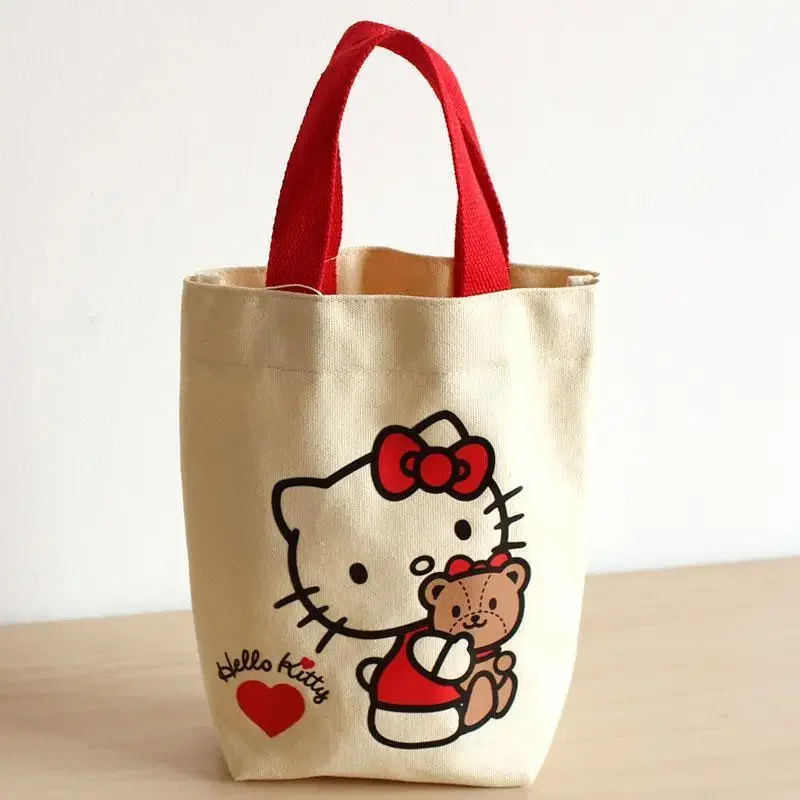 thumbnail image 1 of Miniso Sanrio Anime Kawaii Hello Kitty bolsos lindo dibujos animados lona bolsa de almuerzo taza de agua bolsa de almacenamiento portátil Bentobag regalos para niñas, 1 of 5